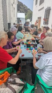 Dia Internacional de tejer en público 2025 con Hilacar en Pampaneira
